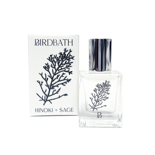 Birdbath Hinoki + Sage perfume bottle and packaging on a white background