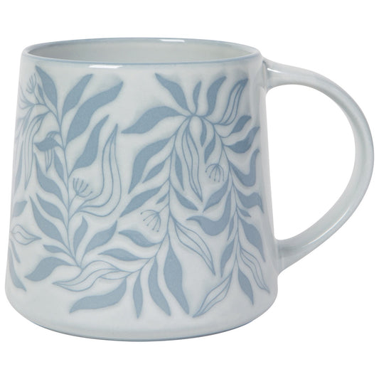 White mug with blue leaf pattern on a white background