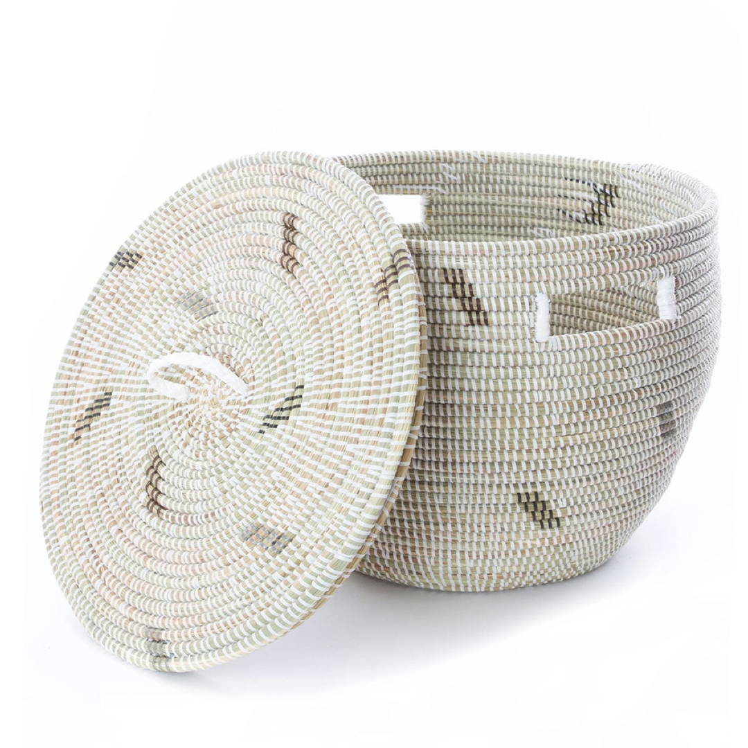 Woven basket with a lid on a white background