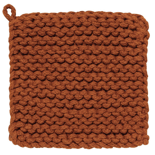 Brown redish knitted pot holder on a white background