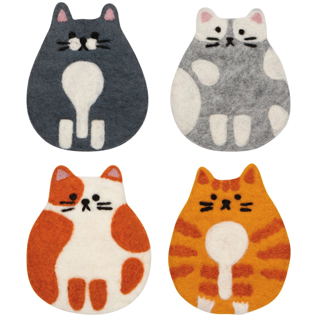 4 felt cat shaped coasters. One cat is dark grey and white, one is light grey with spots, one is white with orange spots, and the last one is an orange tabby
