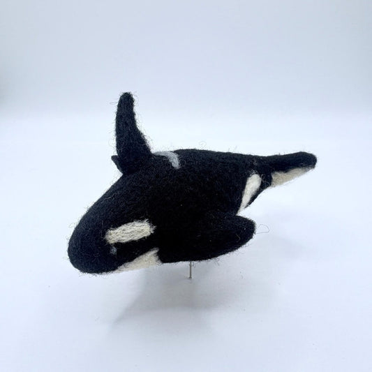 felt orca on a white background