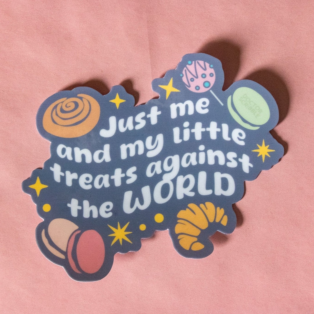Sticker with text 'Just me and my little treats against the world' on a pink background