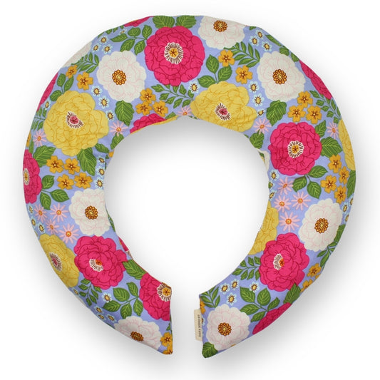 Floral-patterned neck pillow on a white background