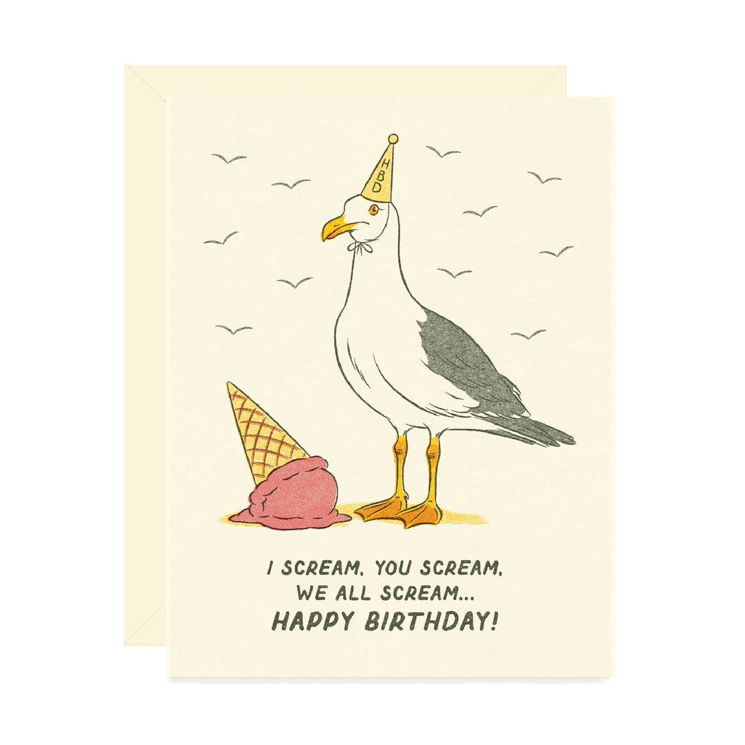 Birthday card with a seagull and ice cream cone on a beige background. Text on card reads "I scream, you scream, we all scream...happy birthday!"