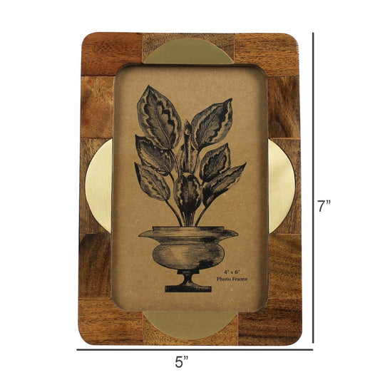 Wooden photo frame with a plant illustration and dimensions on a white background