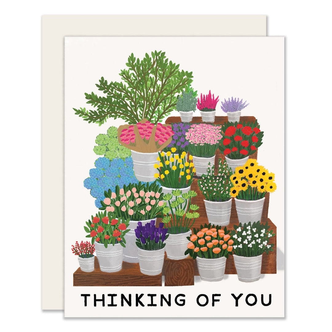 Greeting card with illustration of potted plants and 'Thinking of You' text