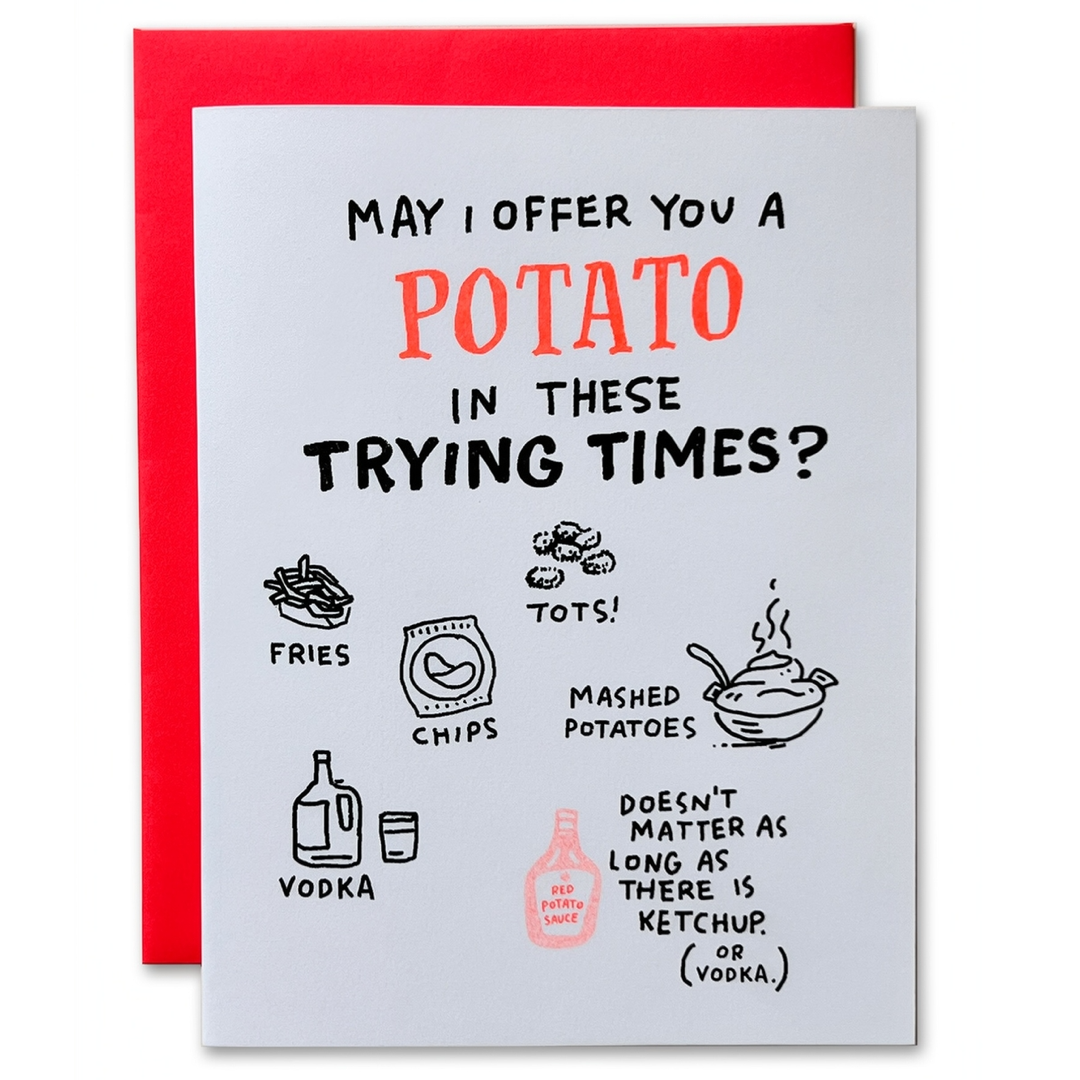 A white greeting card with a humorous potato-themed quote and doodles, shown with a red envelope behind it on a white background. Text at the top reads "May I offer you a potato in these trying times?"