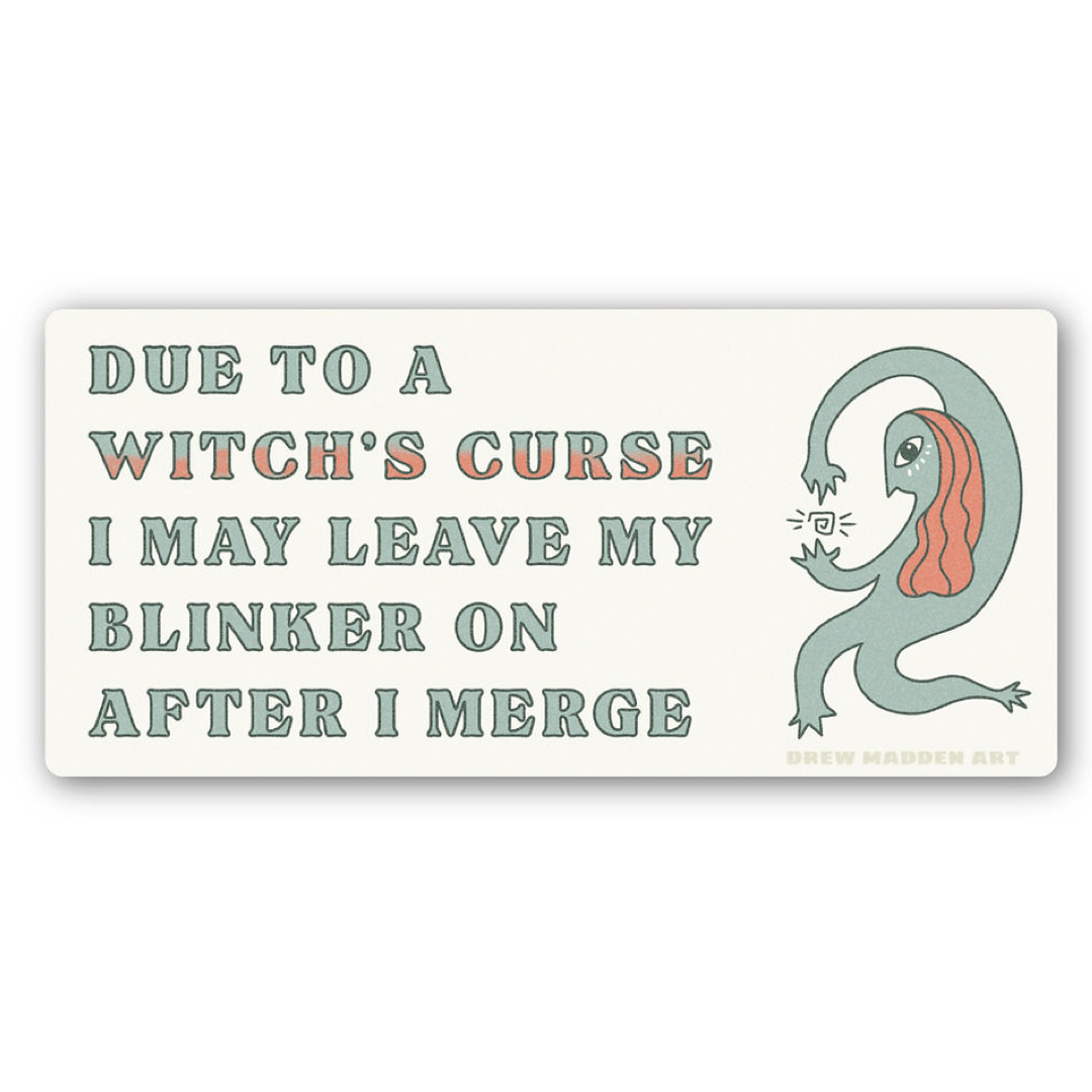 A rectangular bumper sticker with rounded corners on a white background. The design features a light teal goblin-like creature with pink hair next to the text 'DUE TO A WITCH'S CURSE I MAY LEAVE MY BLINKER ON AFTER I MERGE' in muted teal and peach lettering.