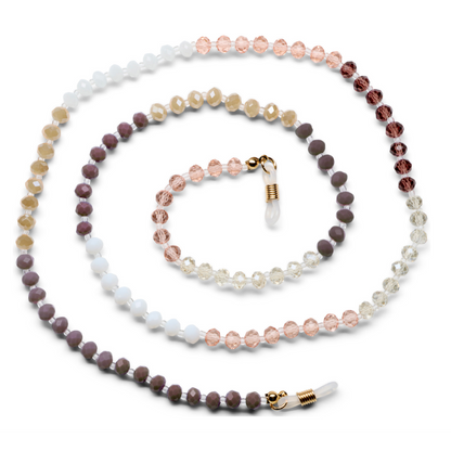 Beaded chain arranged in a spiral on a white background, featuring translucent crystal and faceted beads in shades of pink, white, brown