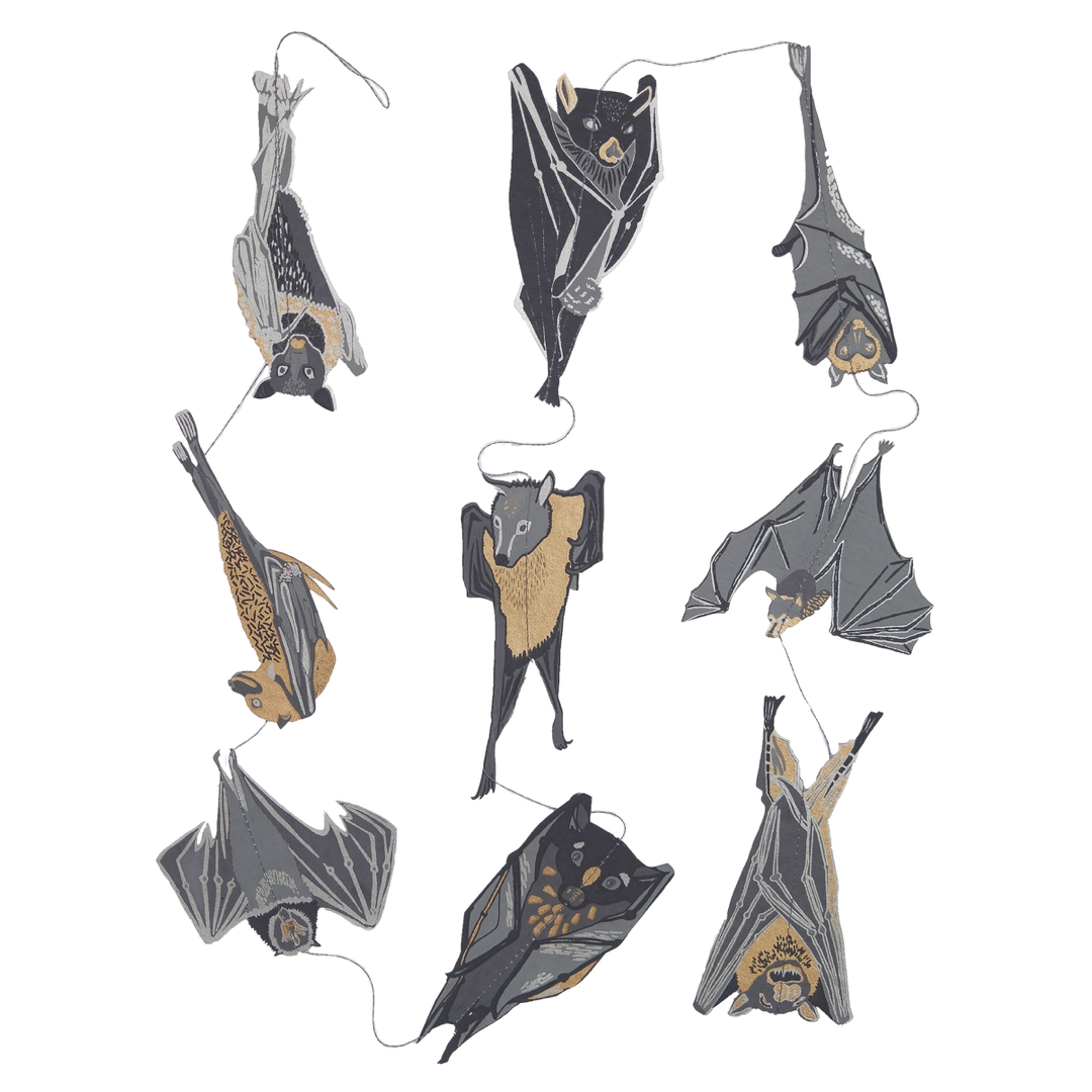 garland with bat-shaped cut outs on a white background