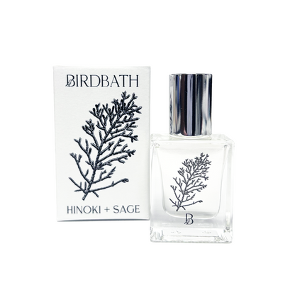Birdbath Hinoki + Sage perfume bottle and packaging on a white background