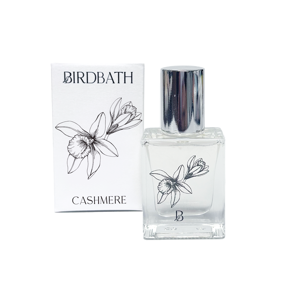 Birdbath Cashmere perfume bottle and packaging on a white background