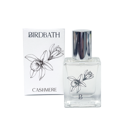 Birdbath Cashmere perfume bottle and packaging on a white background