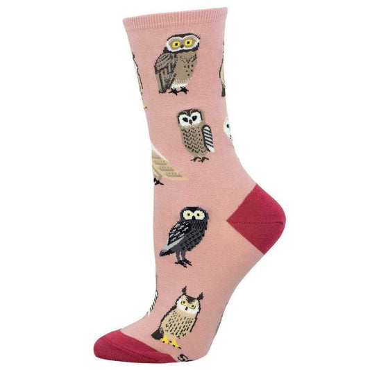 Pink sock with an owl pattern on a white background