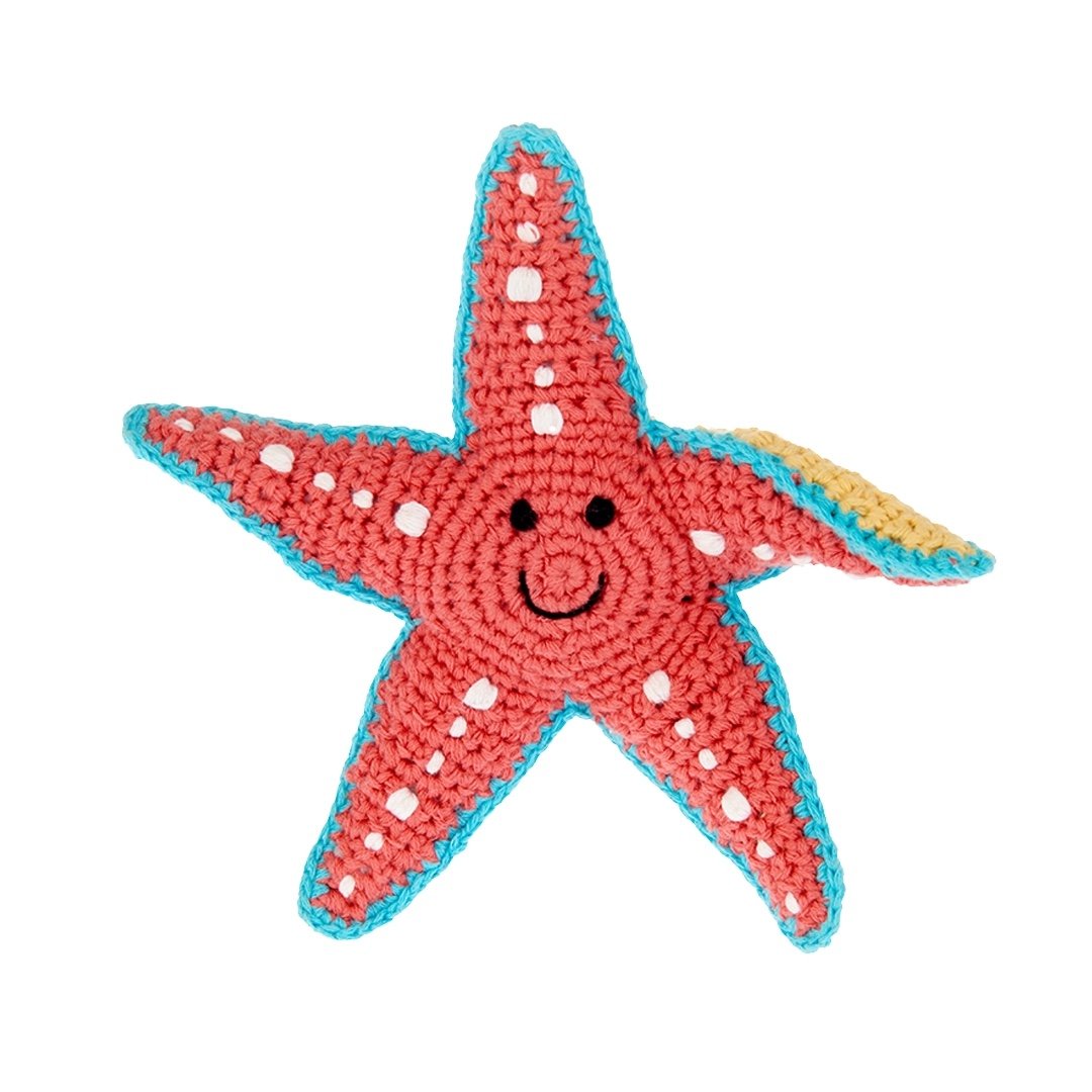 Red starfish-shaped rattle with a smiley face on a white background