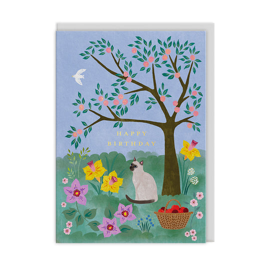 Birthday card with a cat, tree, and flowers on a blue background