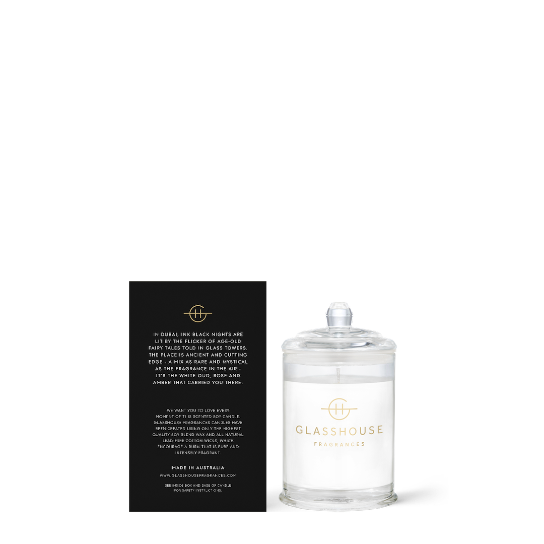 Glasshouse candle with black label on a white background