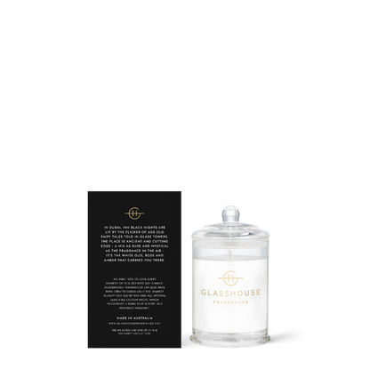 Glasshouse candle with black label on a white background
