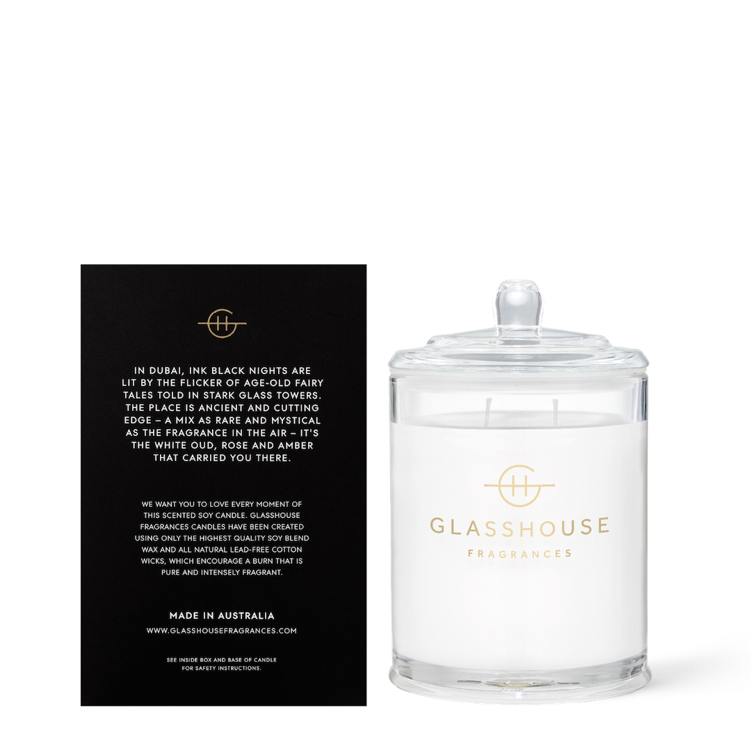 Glasshouse Fragrances candle with packaging on a white background