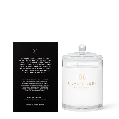 Glasshouse Fragrances candle with packaging on a white background