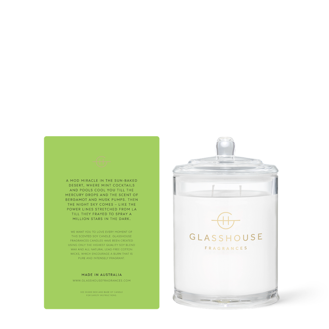 Glasshouse Fragrances candle with its green box on a white background