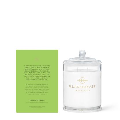 Glasshouse Fragrances candle with its green box on a white background