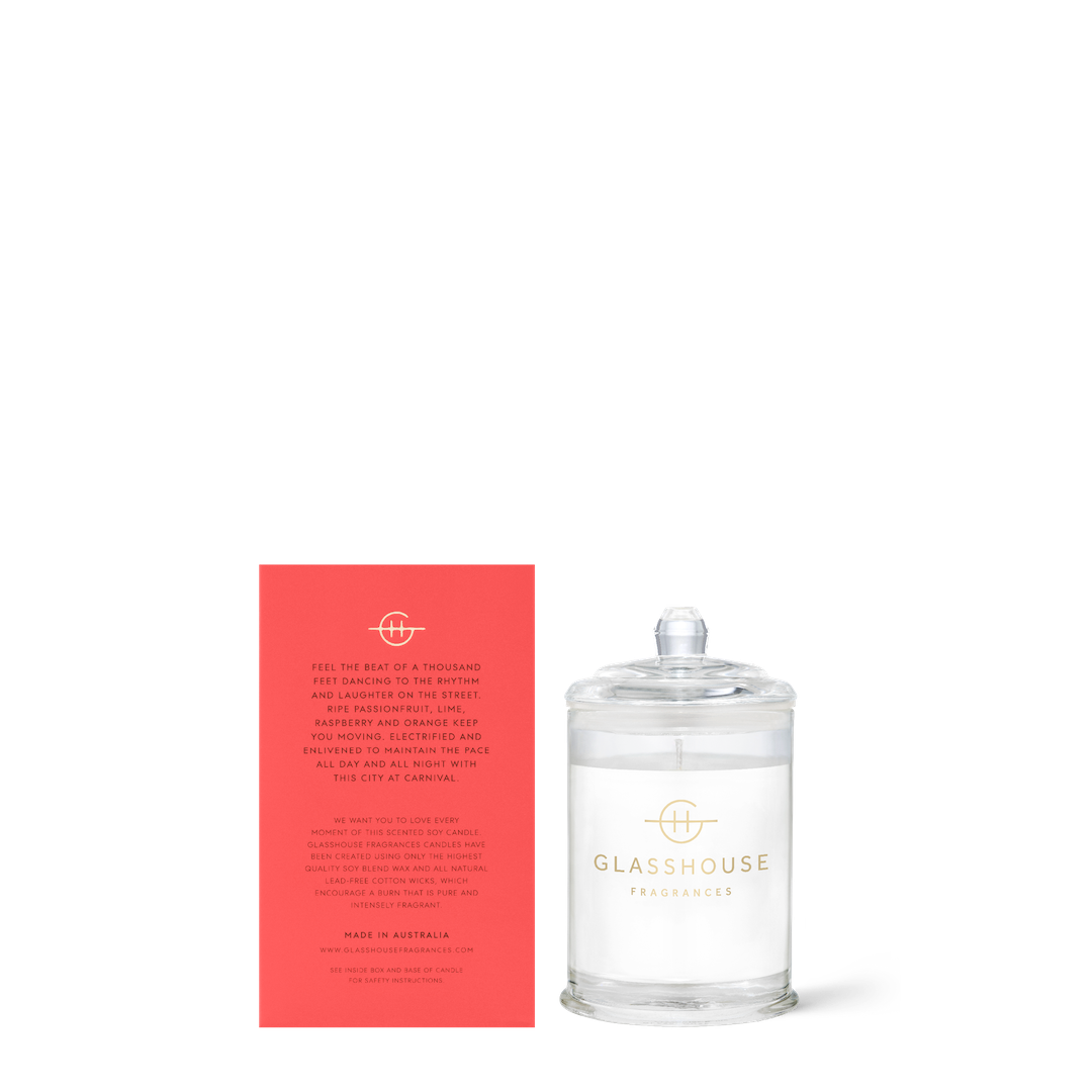 Glasshouse candle with its red box on a white background