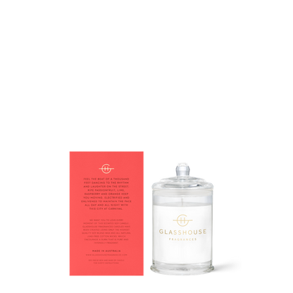 Glasshouse candle with its red box on a white background