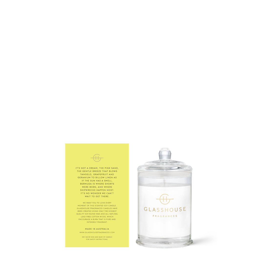 Glasshouse Fragrances candle with yellow box on a white background