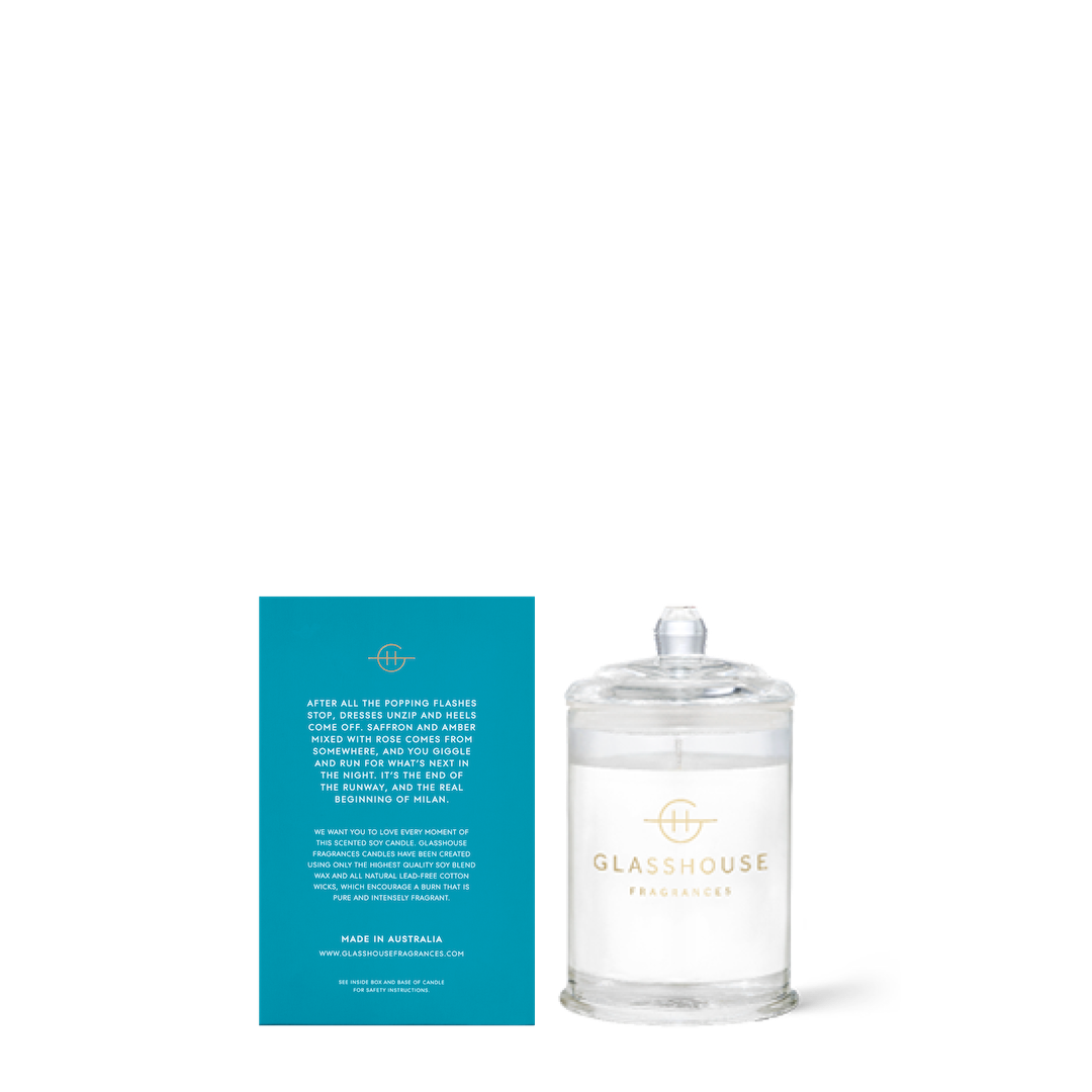 Glasshouse Fragrances candle with its blue box on a white background