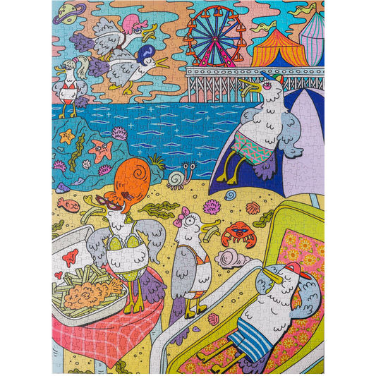 A colorful illustrated puzzle featuring whimsical seagull characters in an ocean fair scene with a Ferris wheel, beach, food stalls, and bright pastel and saturated colors.