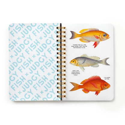 Sticker book with judgy fish themed stickers on a white background