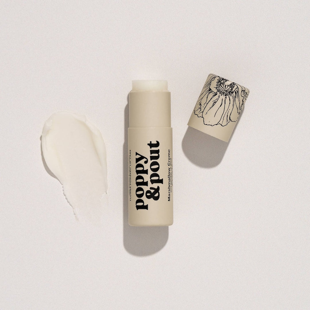 Tube of Lip Balm from Poppy & Pout in the scent Marshmallow Creme on a white background