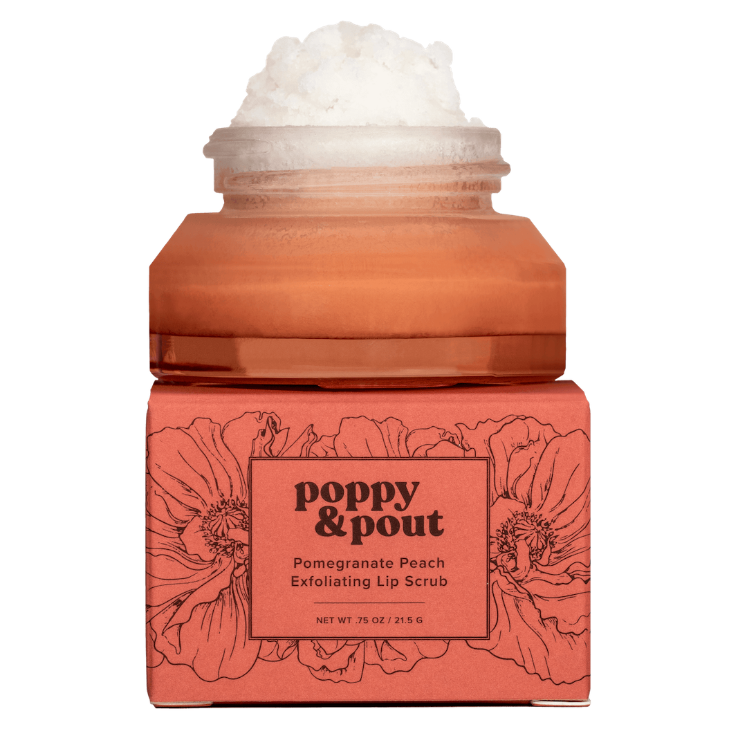 Pink jar of Poppy & Pout Pomegranate Peach Exfoliating Lip Scrub on a white background