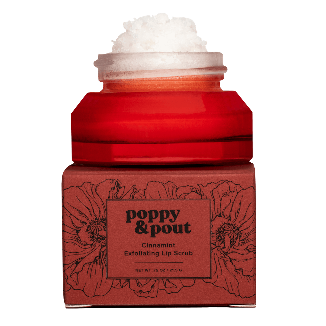 Red jar of 'Poppy & Pout' cinnamint lip scrub on a white background