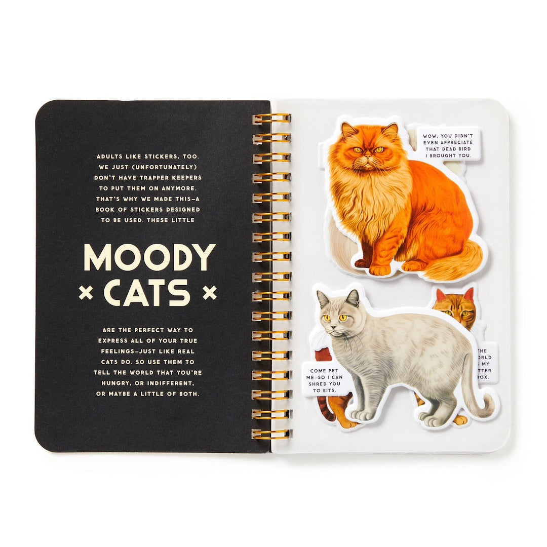 Sticker book with cat-themed stickers on a white background