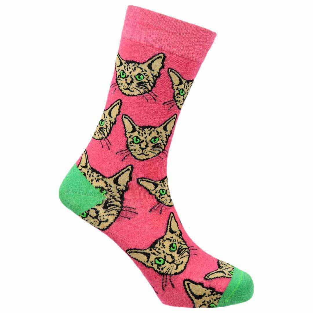 Pink socks with cat face pattern on a white background