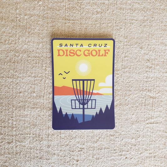 Santa Cruz Disc Golf sticker on a textured beige background