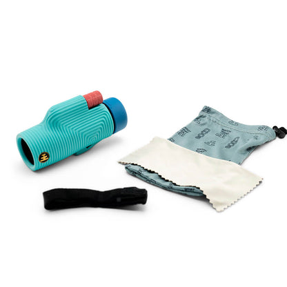 Tahitian blue zoom tube with items included in the box which are a fabric sleeve and strap