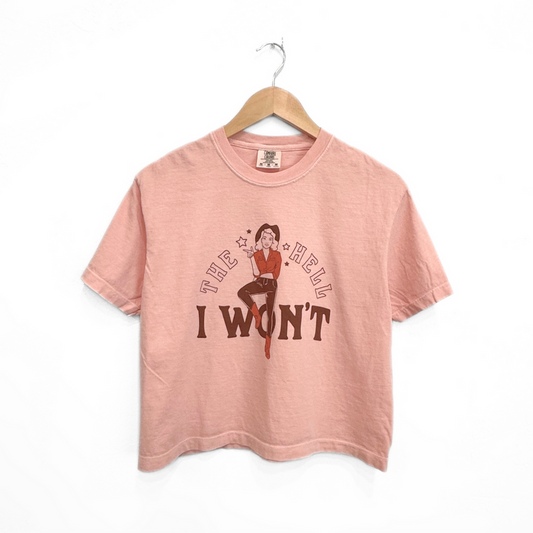 pink cropped t shirt with a cowgirl on it along with text that reads the hell I won't