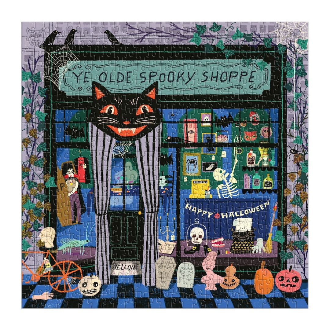 Halloween-themed puzzle with a cat and spooky shop display.