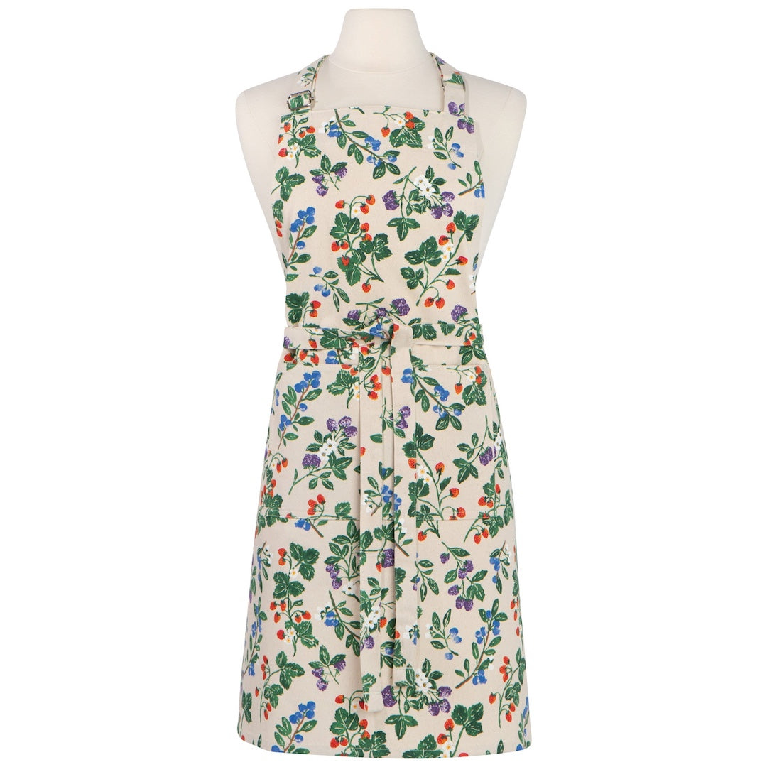 White apron with a berry bush pattern on it on a mannequin 