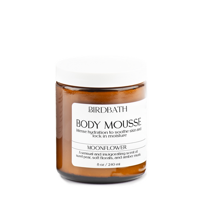 Jar of Birdbath Moonflower Body Mousse with a white label on a white background