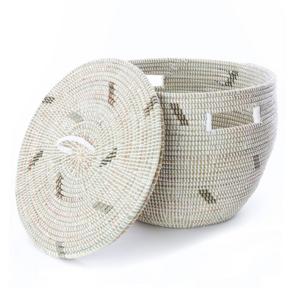 Woven basket with a lid on a white background