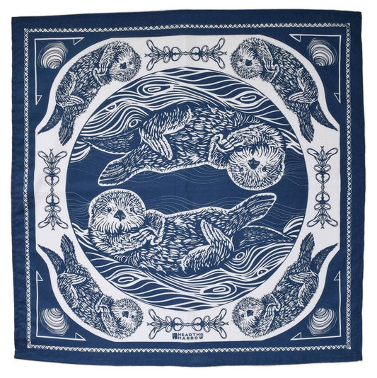 Navy blue and white bandana with otter design on a white background