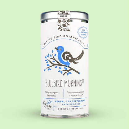 Tea canister labeled 'Bluebird Morning' with branding on a light green background