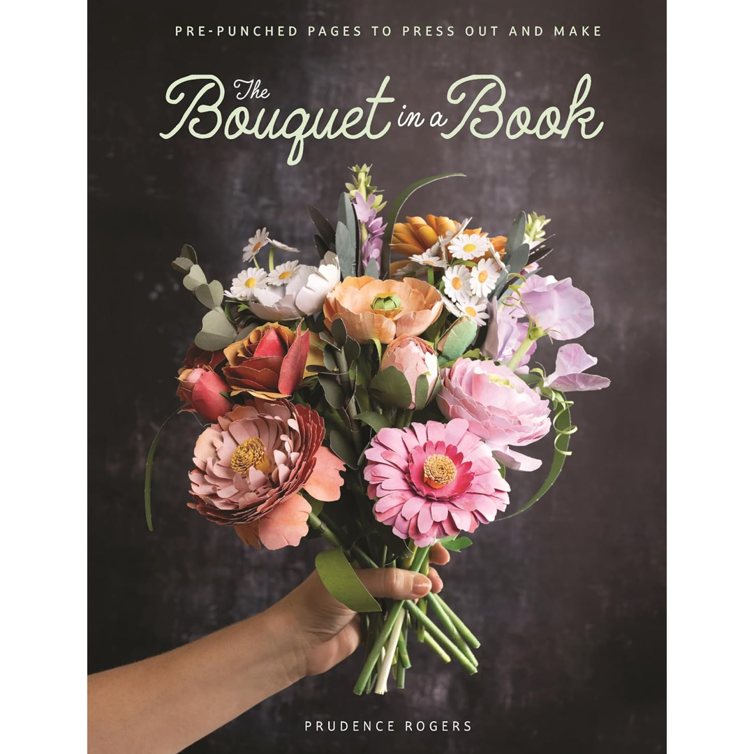 Book cover for 'The Bouquet in a Book' by Prudence Rogers, featuring a hand holding a colorful bouquet of pink, peach, white, and purple flowers against a dark textured background.