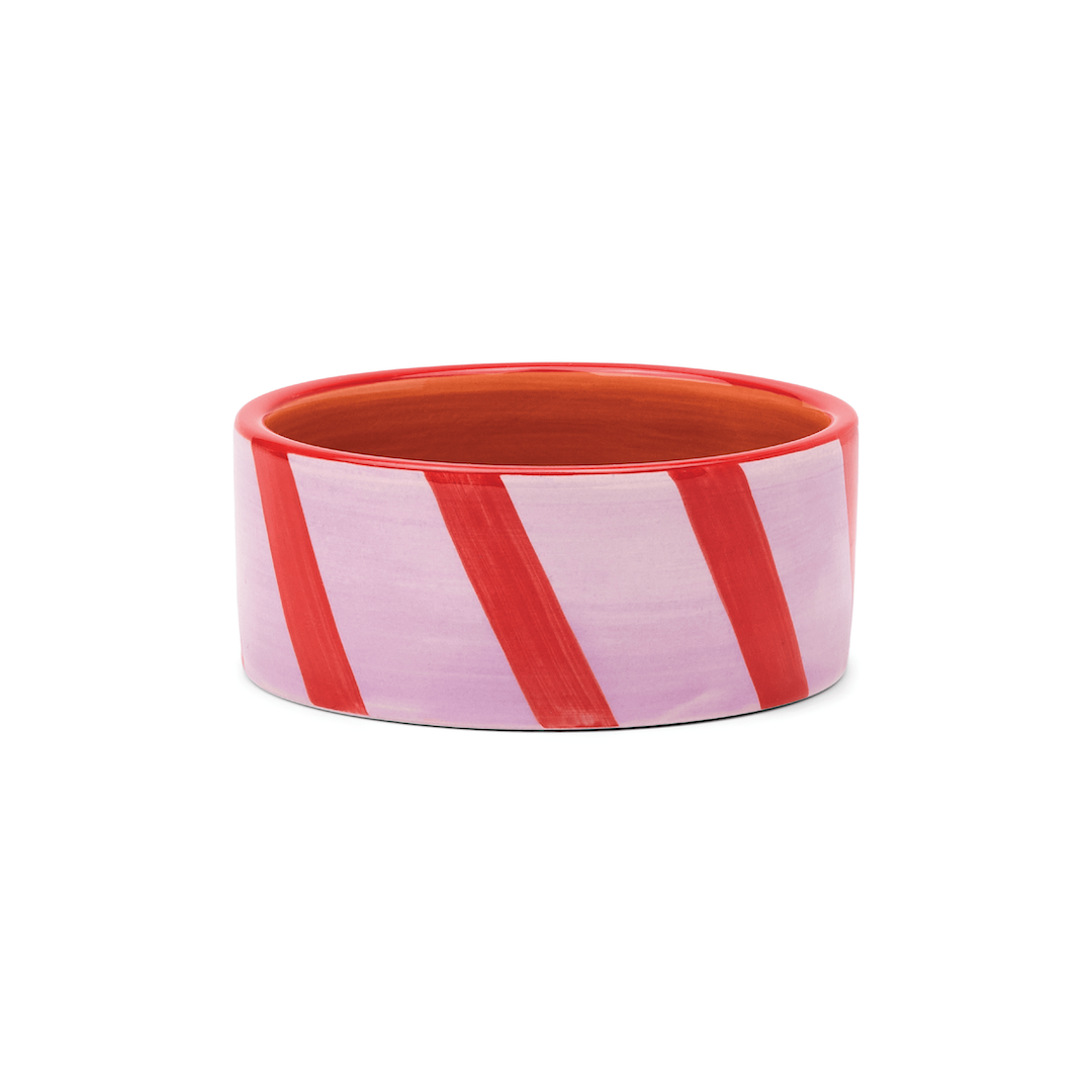 Red and pink striped wine coaster on a white background
