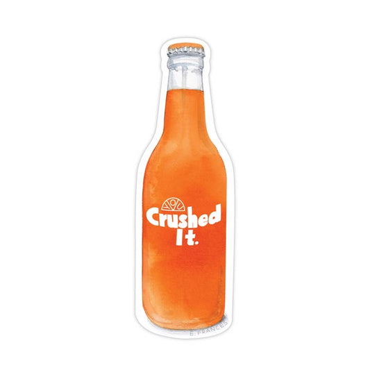 Orange soda bottle with 'Crushed It.' text on a white background